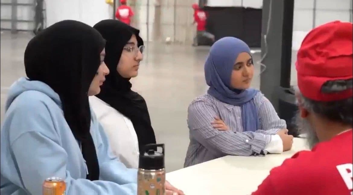 ITKAN students in a Q&A session with Texas Instruments volunteers