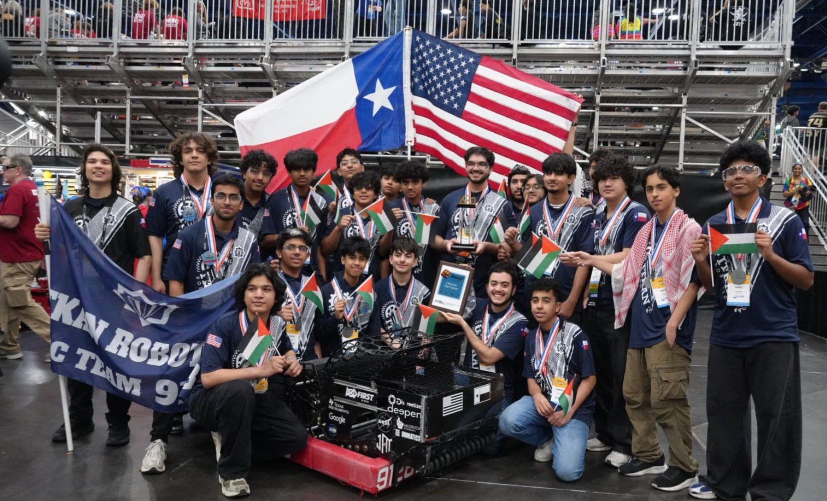 ITKAN Robotics Team 9128 with their trophy and flags at the 2026 FIRST World Championship in Houston