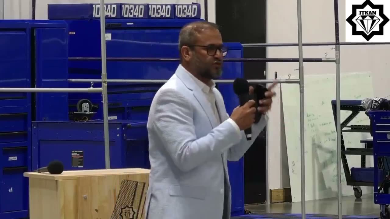 Mujeeb Kazi speaking at the NTIC Luncheon